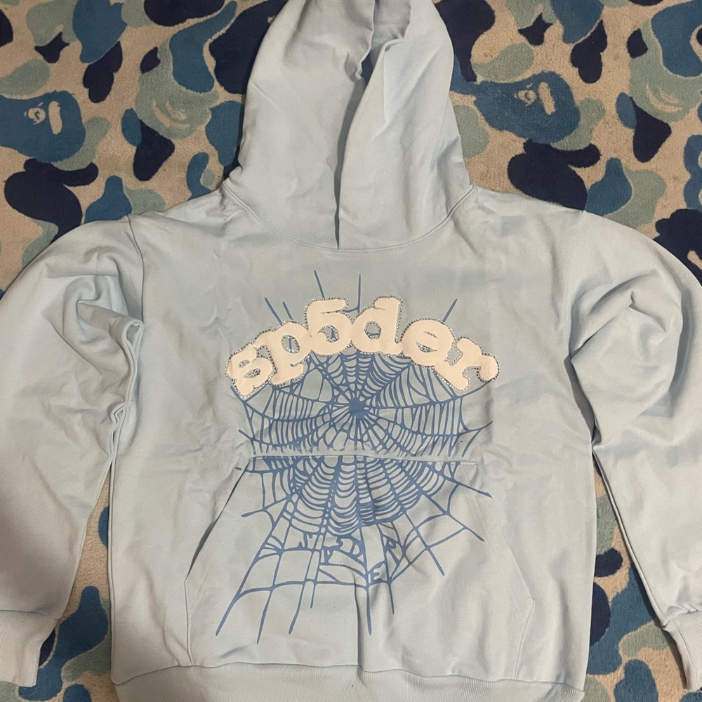 Spyder Light Blue Hoodie with Web Design